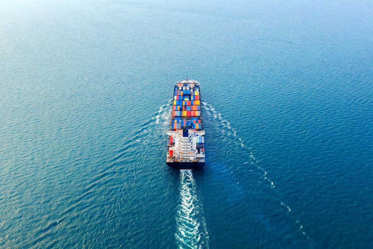 Cargo ship transporting containers at sea